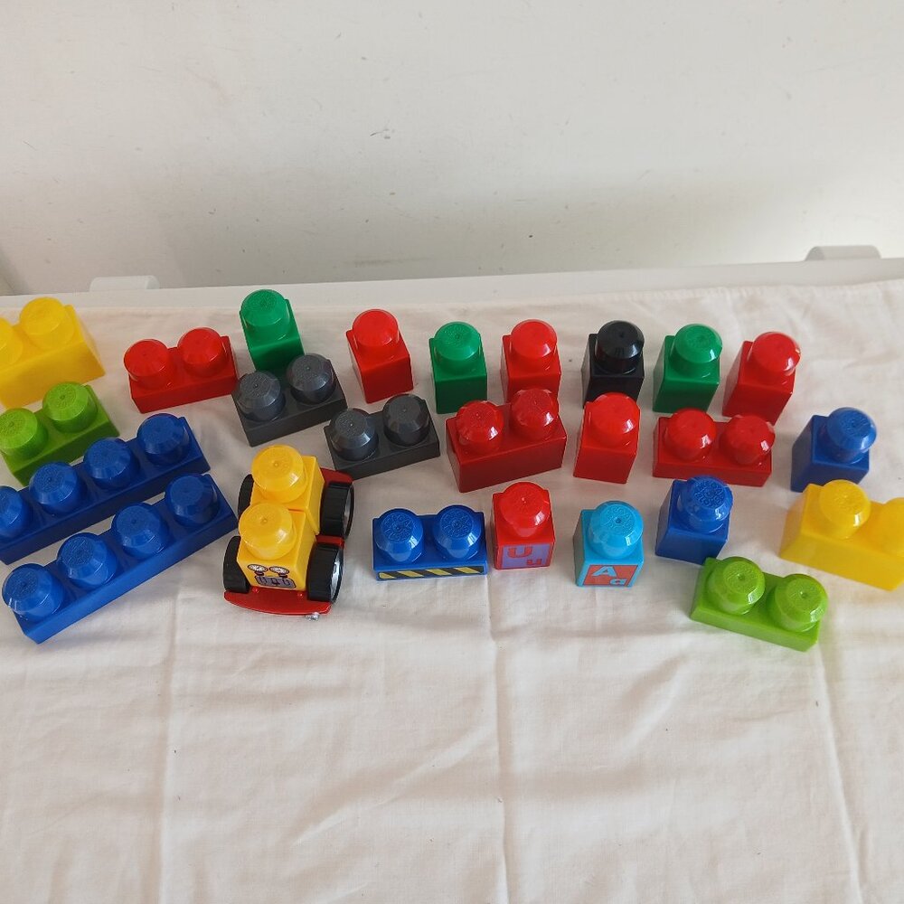 Mega Blocks includes Car ( 27 pieces in all )